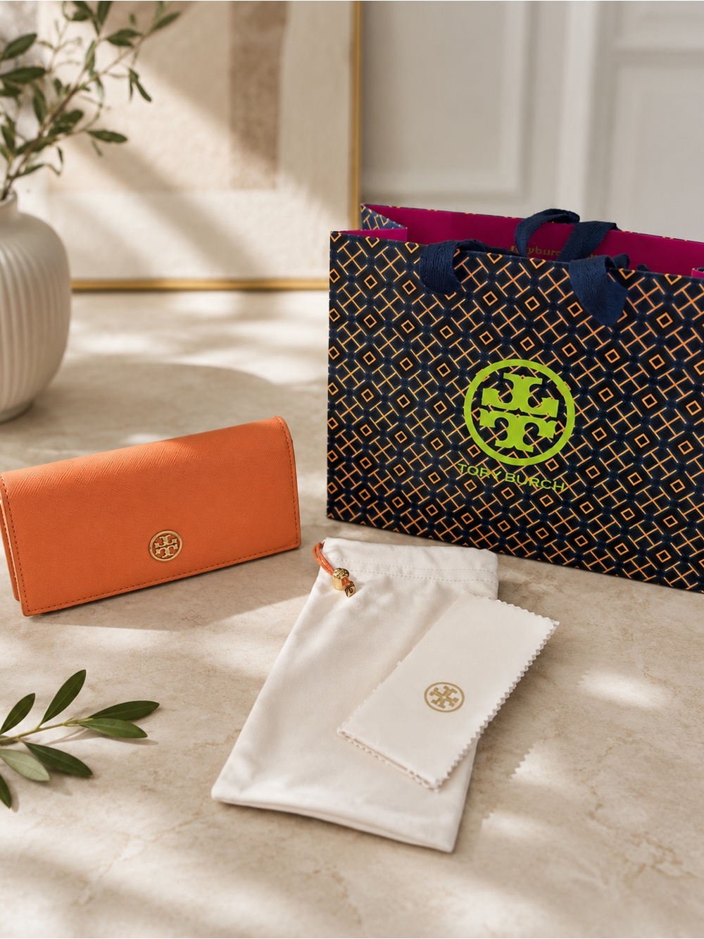 Tory Burch Orange glass case